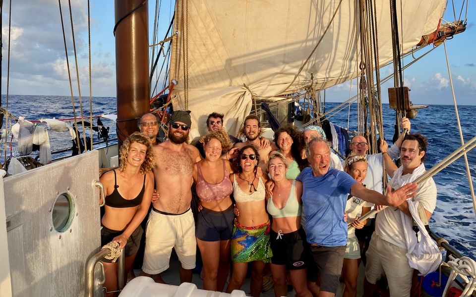 Ocean Nomads crew together on deck during an Atlantic crossing